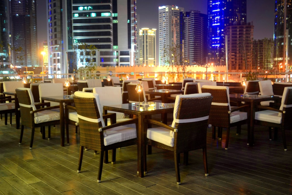 Magnum Hotel & Suites West Bay — снимок 12