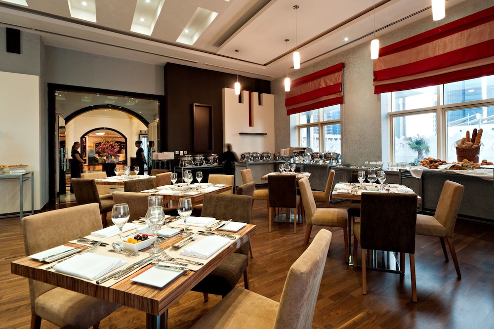 Magnum Hotel & Suites West Bay — снимок 14