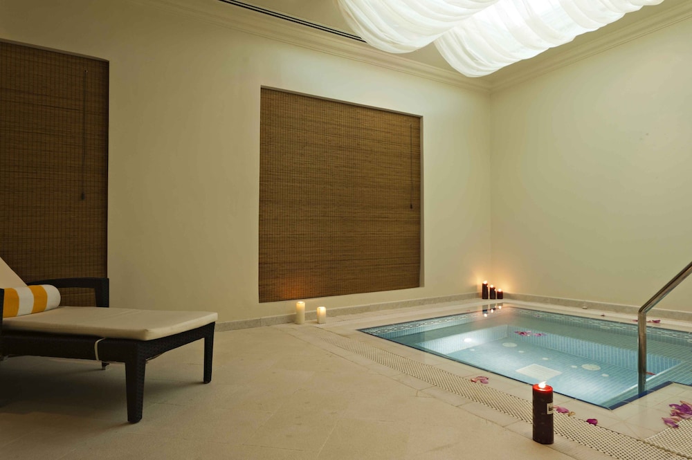 Magnum Hotel & Suites West Bay — снимок 3