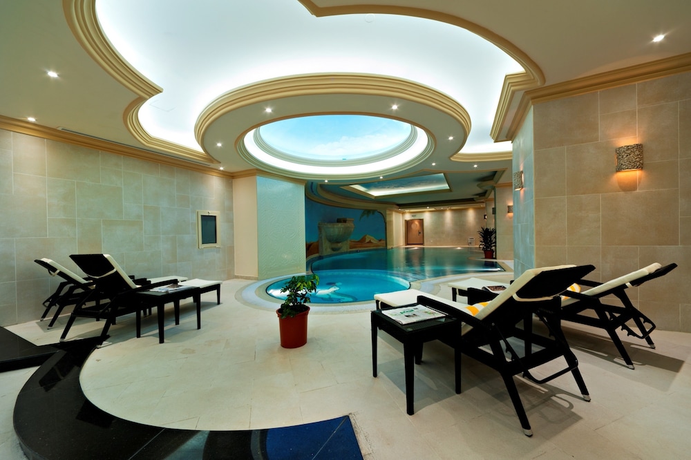 Magnum Hotel & Suites West Bay — снимок 29