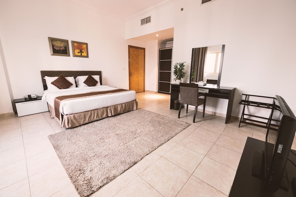 Magnum Hotel & Suites West Bay — снимок 30