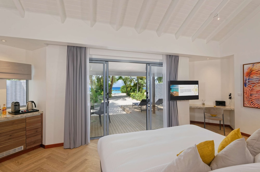 Outrigger Maldives Maafushivaru Resort — снимок 26
