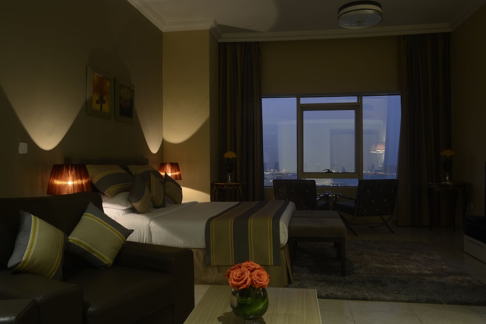 Magnum Hotel & Suites West Bay — снимок 2
