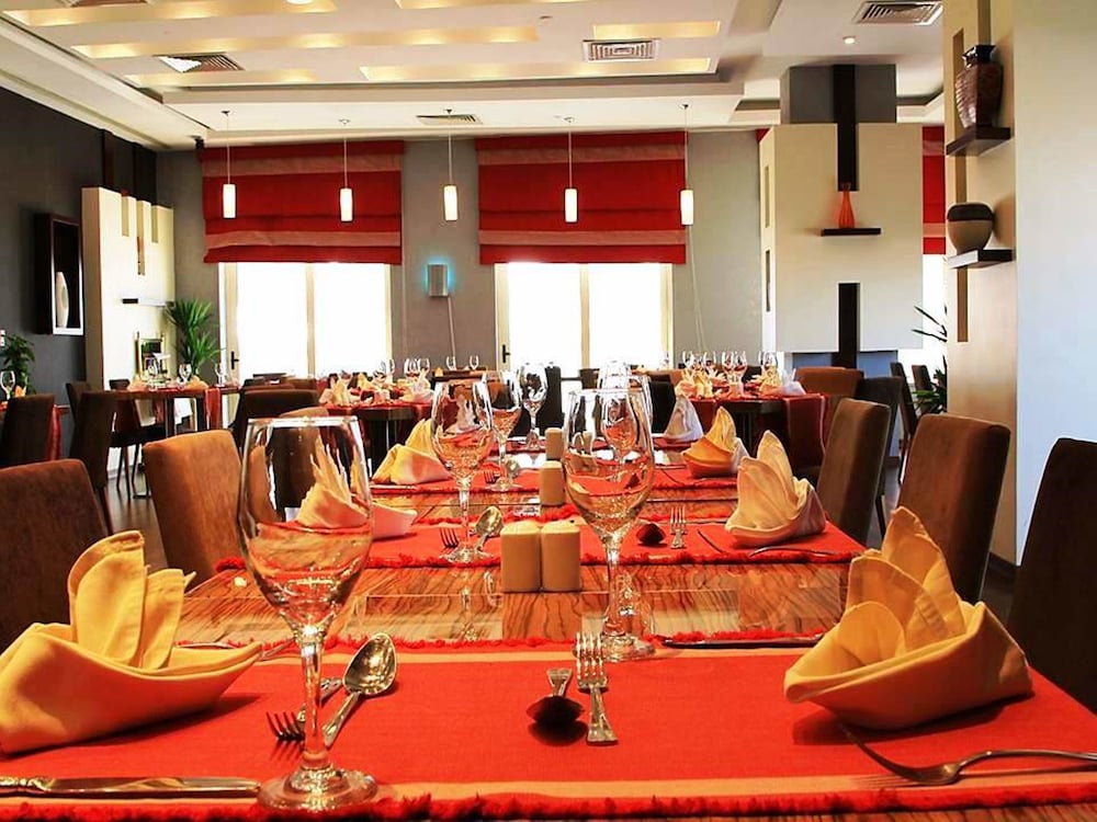 Magnum Hotel & Suites West Bay — снимок 5