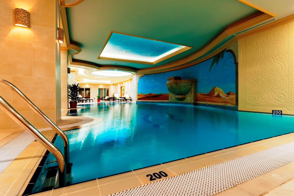 Magnum Hotel & Suites West Bay — снимок 9