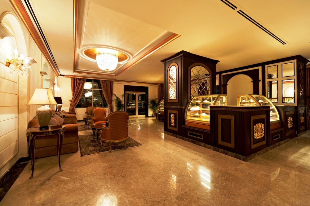 Magnum Hotel & Suites West Bay — снимок 26