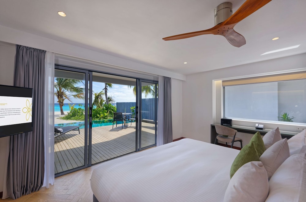 Outrigger Maldives Maafushivaru Resort — снимок 22