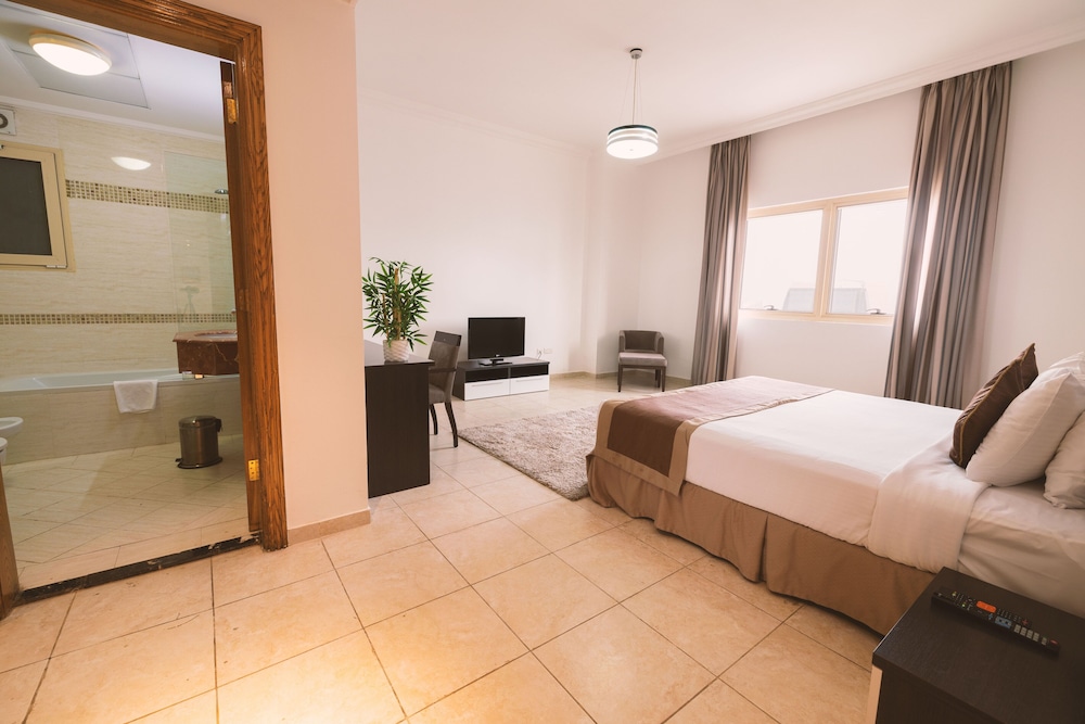 Magnum Hotel & Suites West Bay — снимок 19